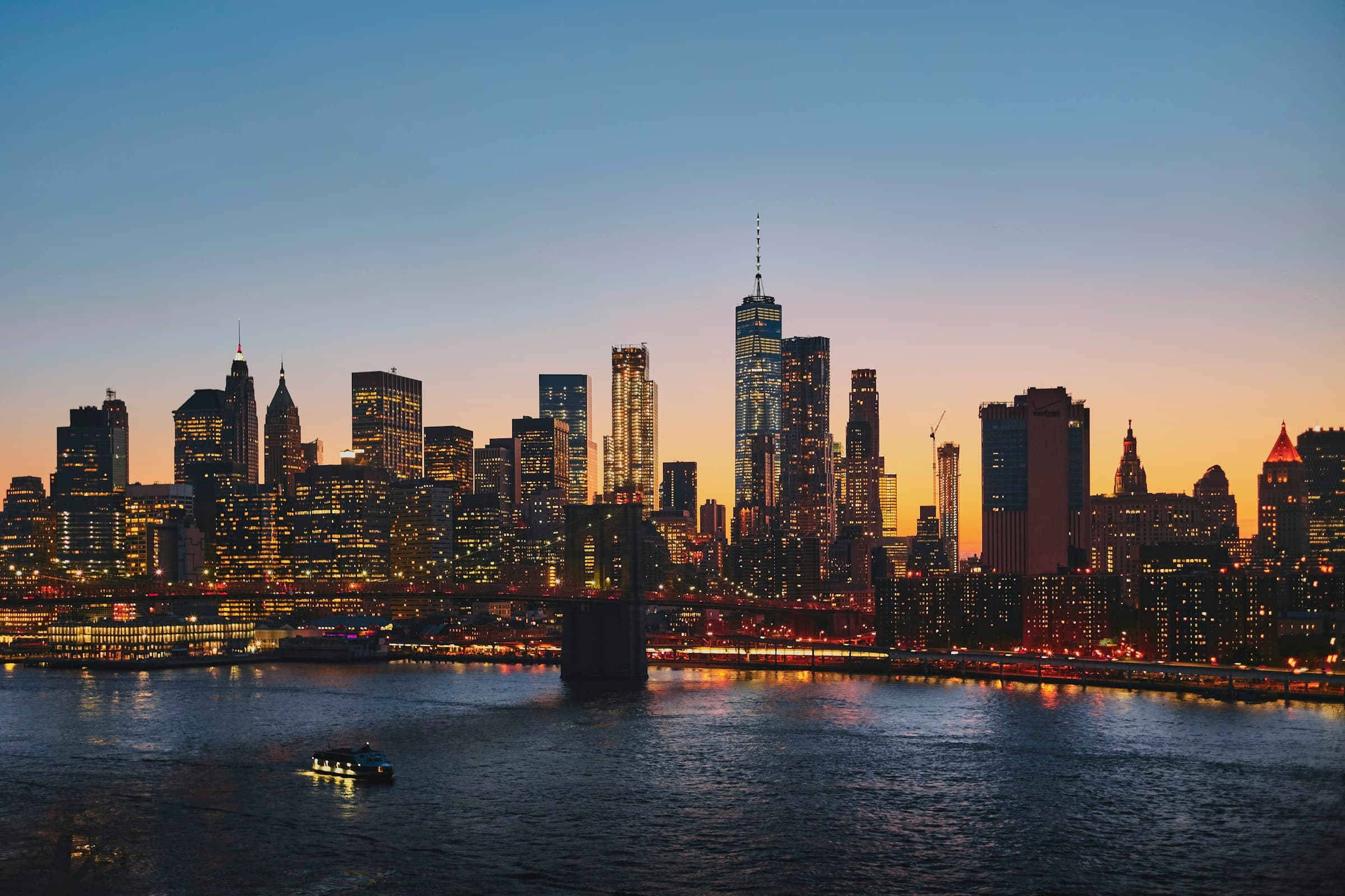 Brooklyn Bridge and the Manhattan skyline at twilight