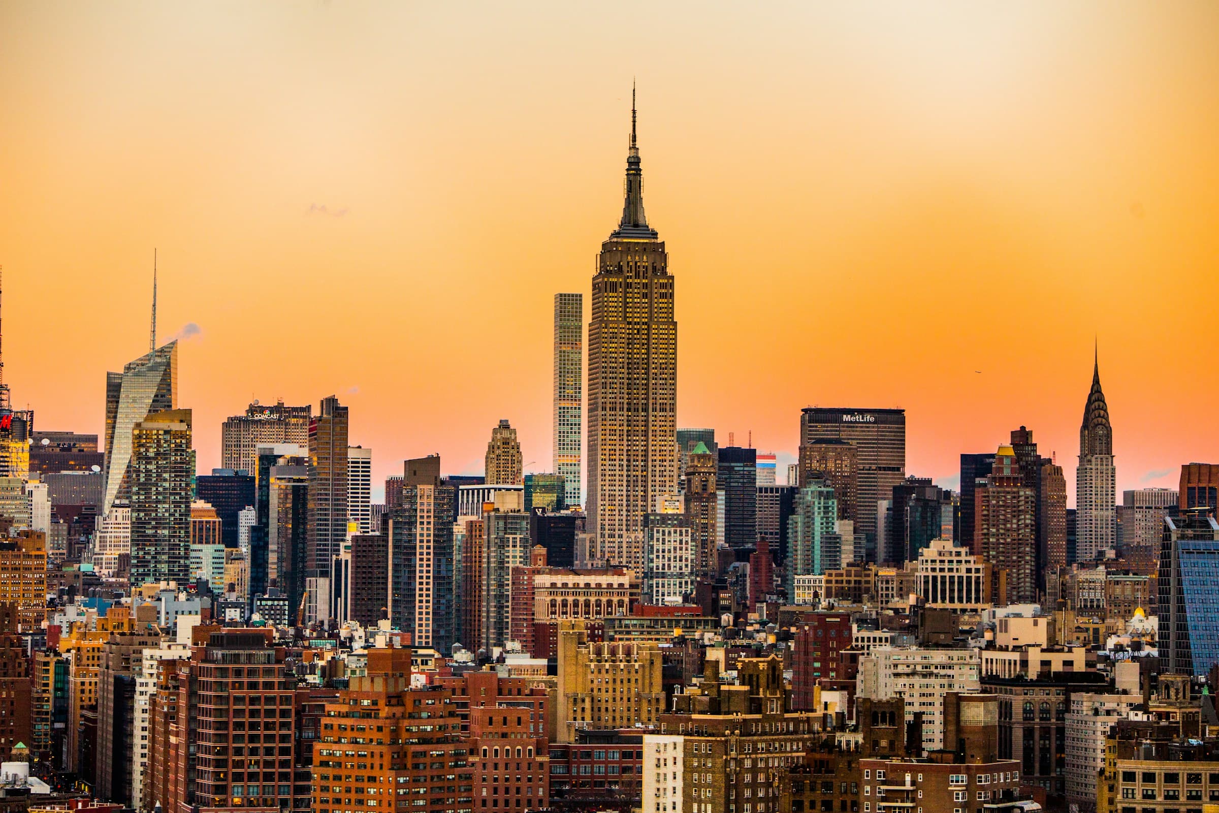 Midtown Manhattan skyline at sunset with the Empire State Building